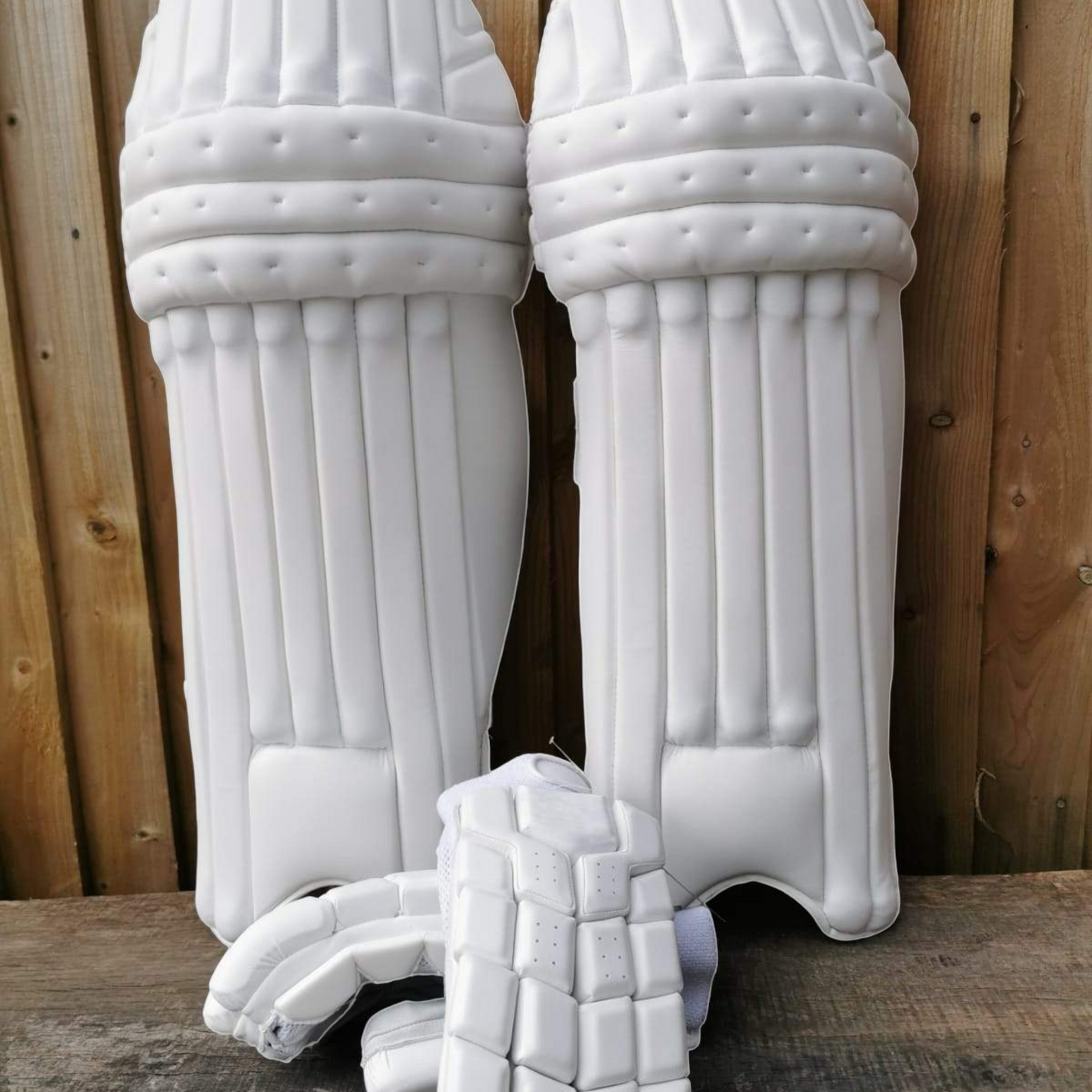 Protective cricket gear softs pads gloves thigh pads leg guard online shop showroom same day collection